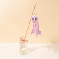 Colourful octopus cat toy on a long stick, shown in grey, pink, purple and red variants.