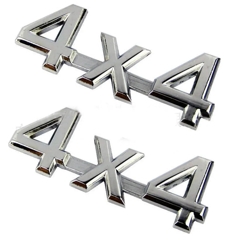 Metal 3D 4x4 rear car badge sticker in silver plated finish on a vehicle boot