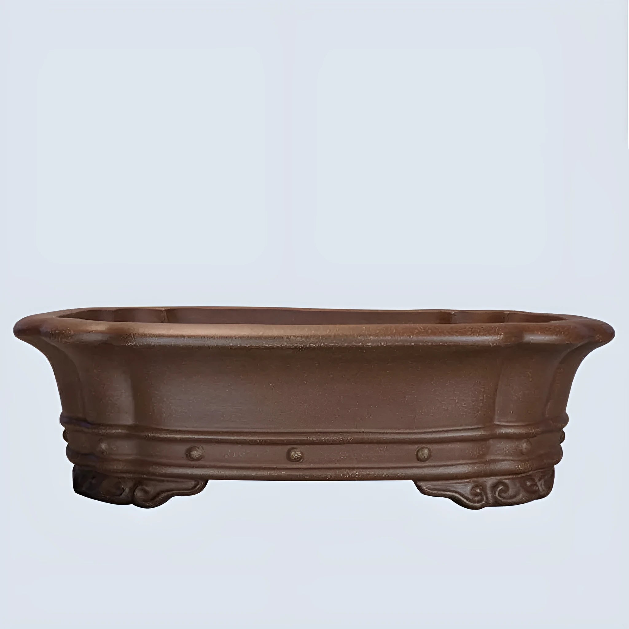 Purple sand clay handmade rectangular antique begonia flower pot on a desktop.