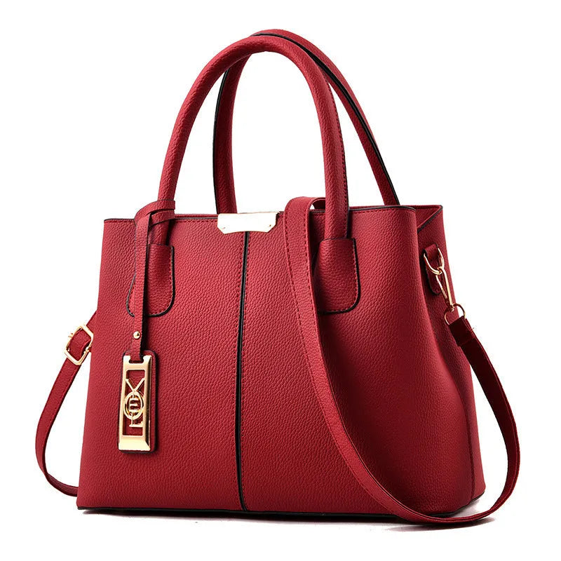 Soft PU leather large capacity shoulder bag for women in a horizontal square shape with an adjustable strap.