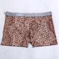 Men's loose fit leopard print boxer shorts in polyester milk silk fabric showing mid-waist design