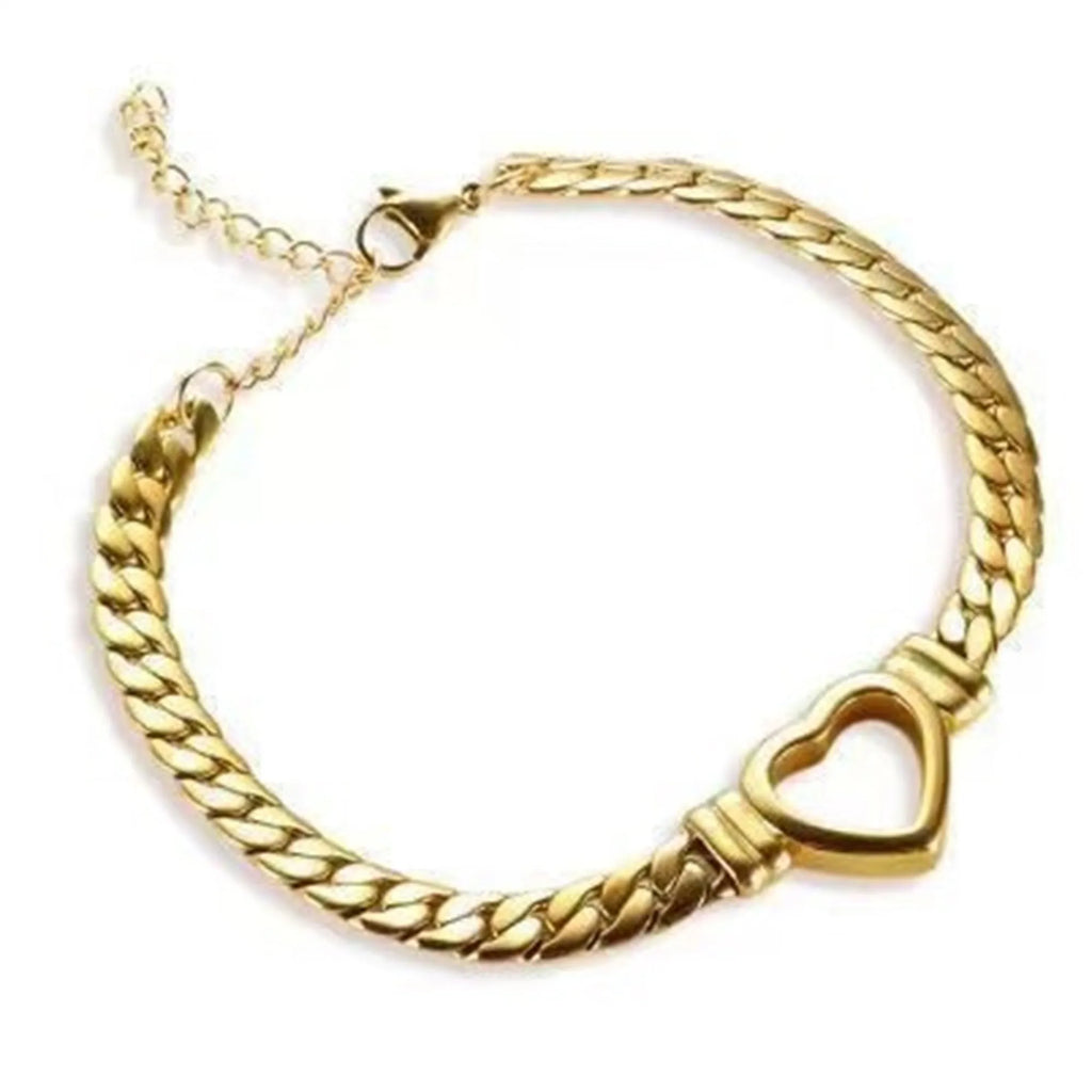 Gold titanium steel personalised love chain necklace and bracelet set with Cuban links and heart shape on white background