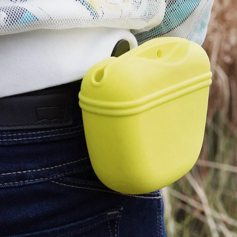 Silicone dog training treat pouch with magnetic closure and metal clip in assorted colours.
