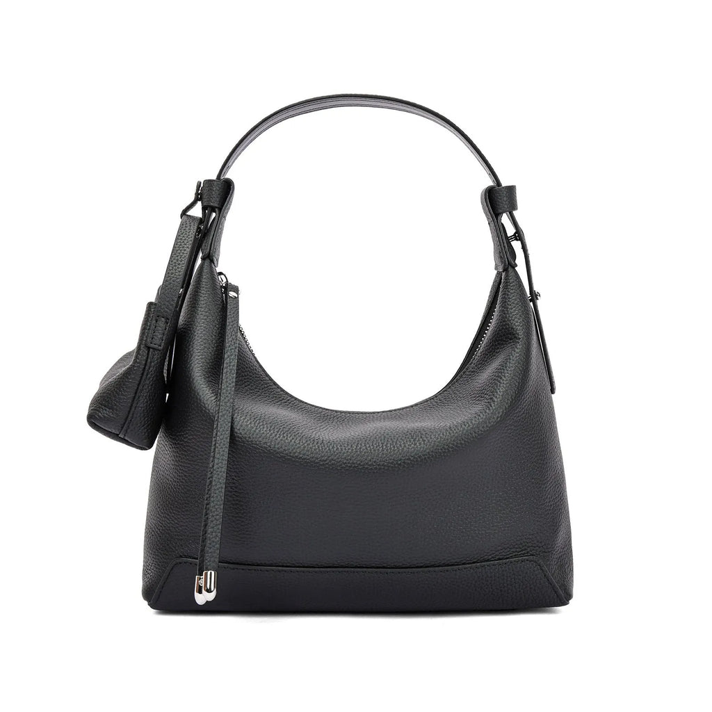 Genuine cowhide leather women's shoulder bag in urban simplicity style, shown in soft construction.