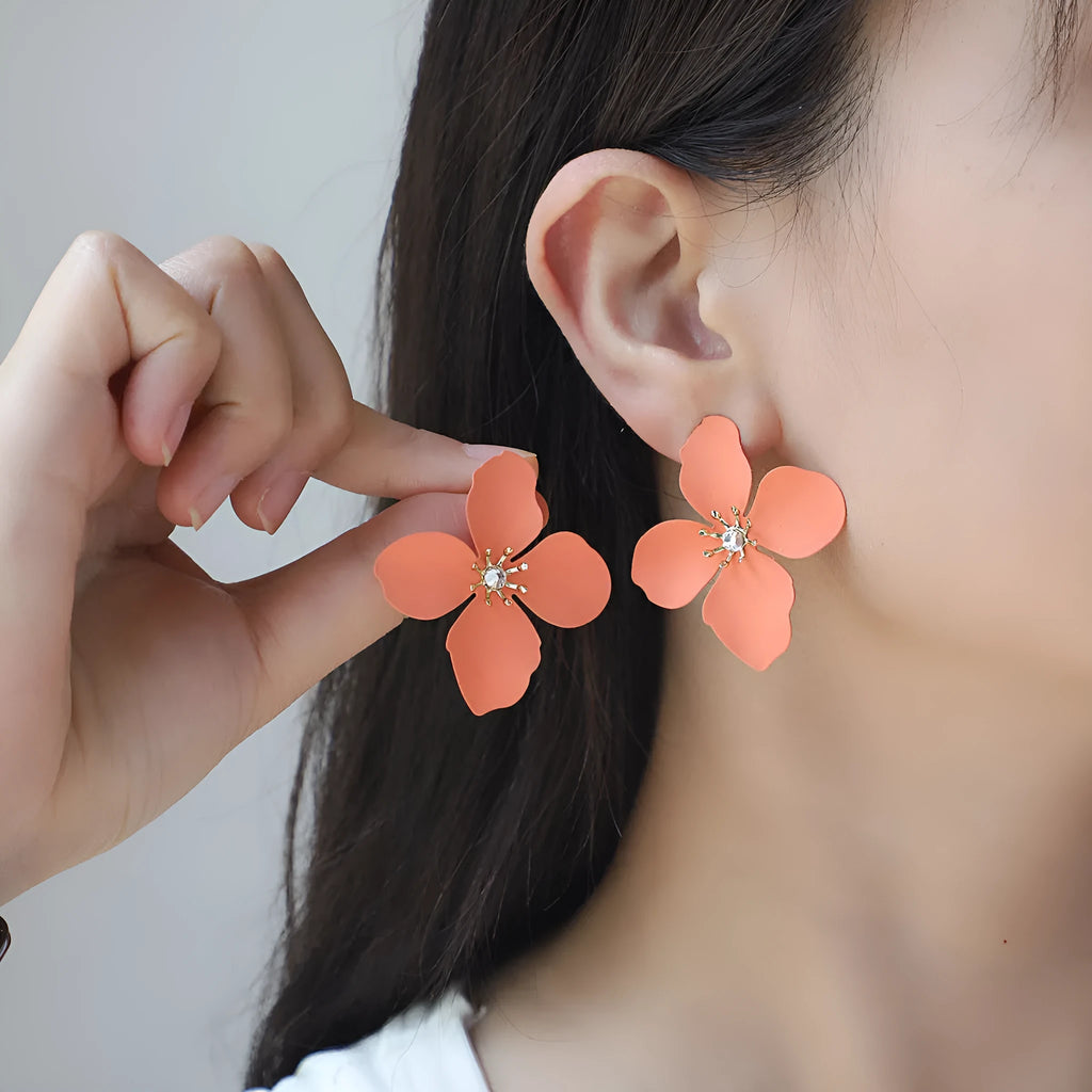 Colorful alloy flower stud earrings in WQE06617 colour option on a white background