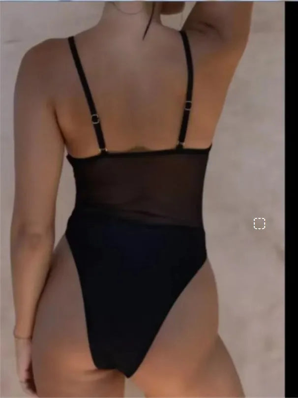 Women's transparent one-piece swimsuit with banded bikini styling in black colour