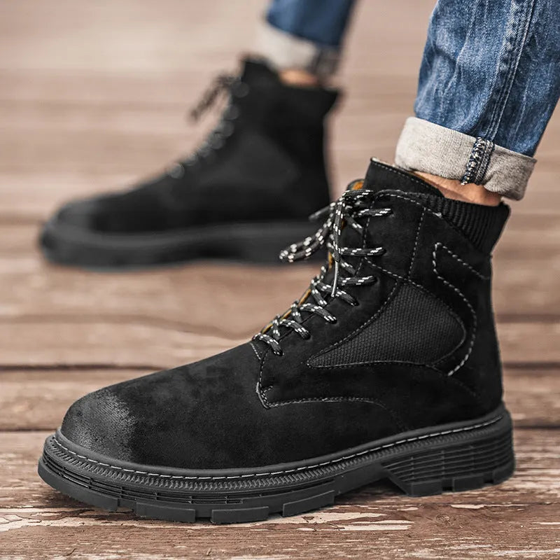 Men's ankle-high Martin boots in frosted sand-colour leather with a round toe and thick rubber sole.