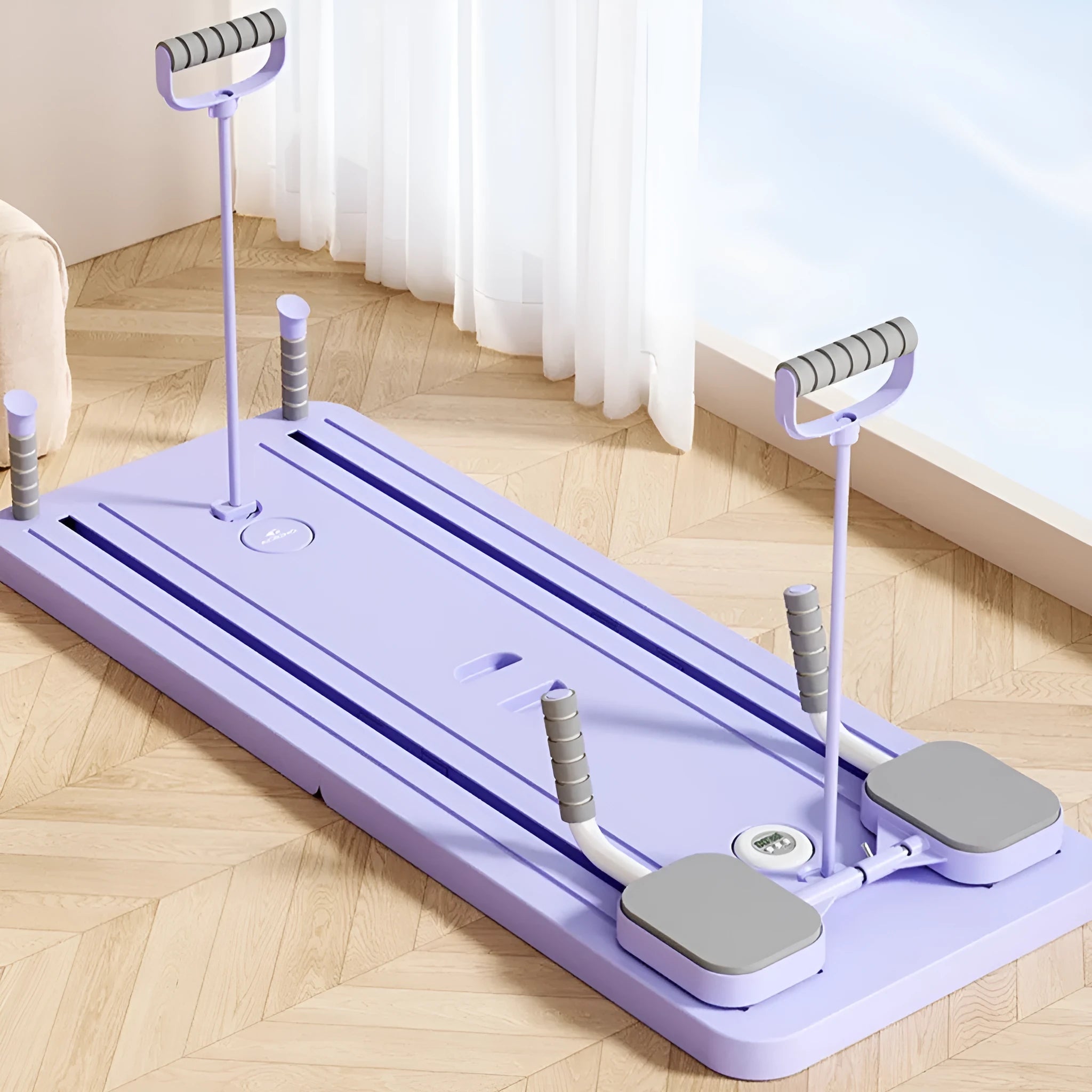 Purple automatic rebound abdominal exercise wheel on a grey floor for home fitness training.