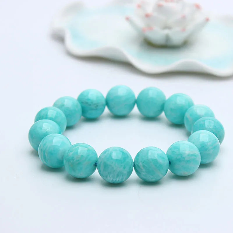 Amazonite gemstone bracelet showing natural blue-green beads in one of three available sizes: 8mm, 9mm or 10mm diameter