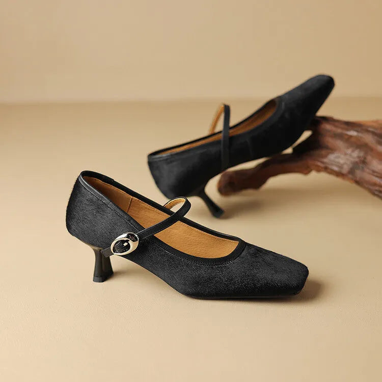 Black women's square toe stiletto heel ankle-strap shoes with a textured horse hair upper.