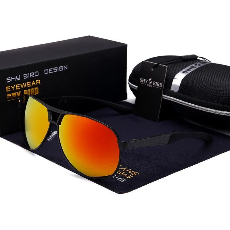 Men's aviator-style sunglasses with orange red polarised lenses and a metal frame on a grey background.