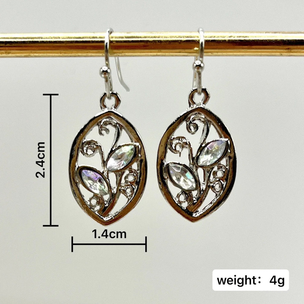 Silver colour alloy earrings with a leaf design and embedded colourful moonstones for women.