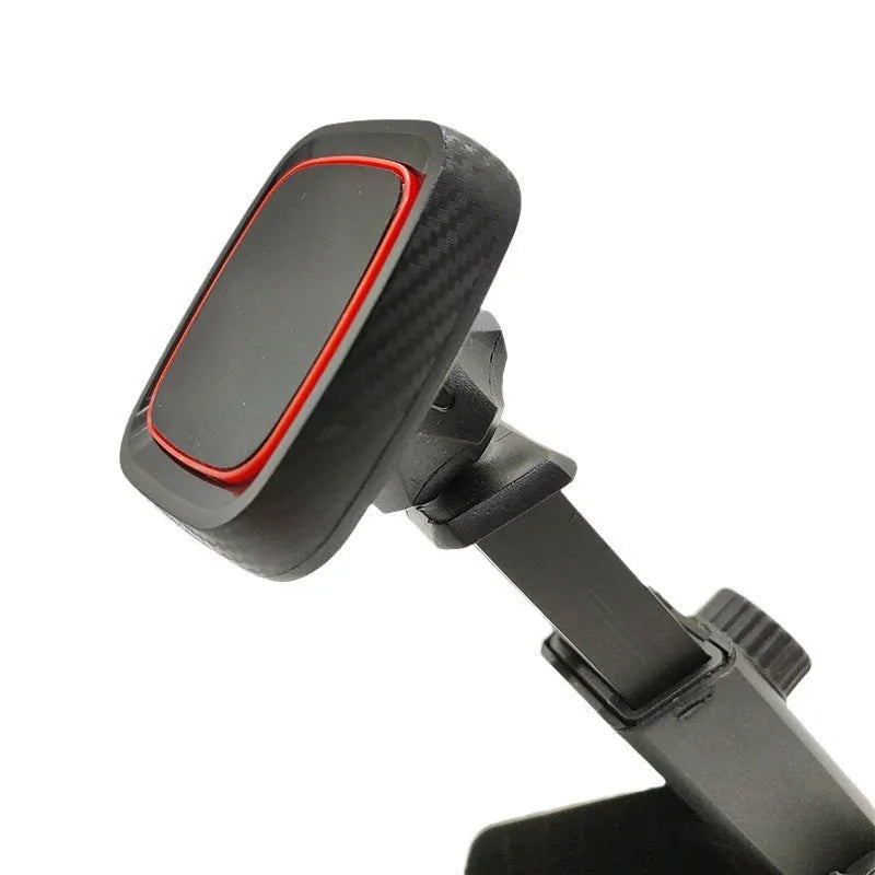 Black flexible gooseneck air vent phone holder mounted on a car dashboard
