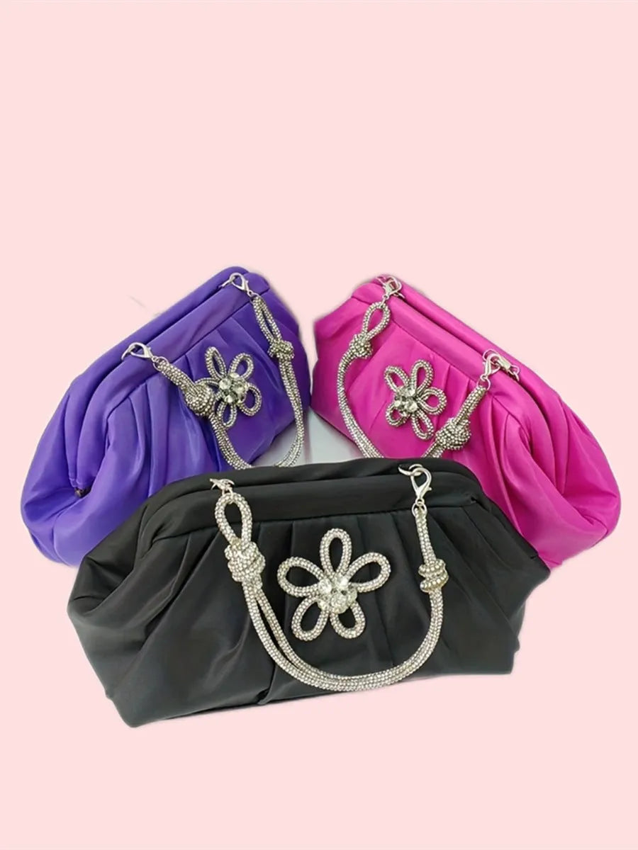 Soft black women's large-capacity dinner bag with chain strap and shell shape.