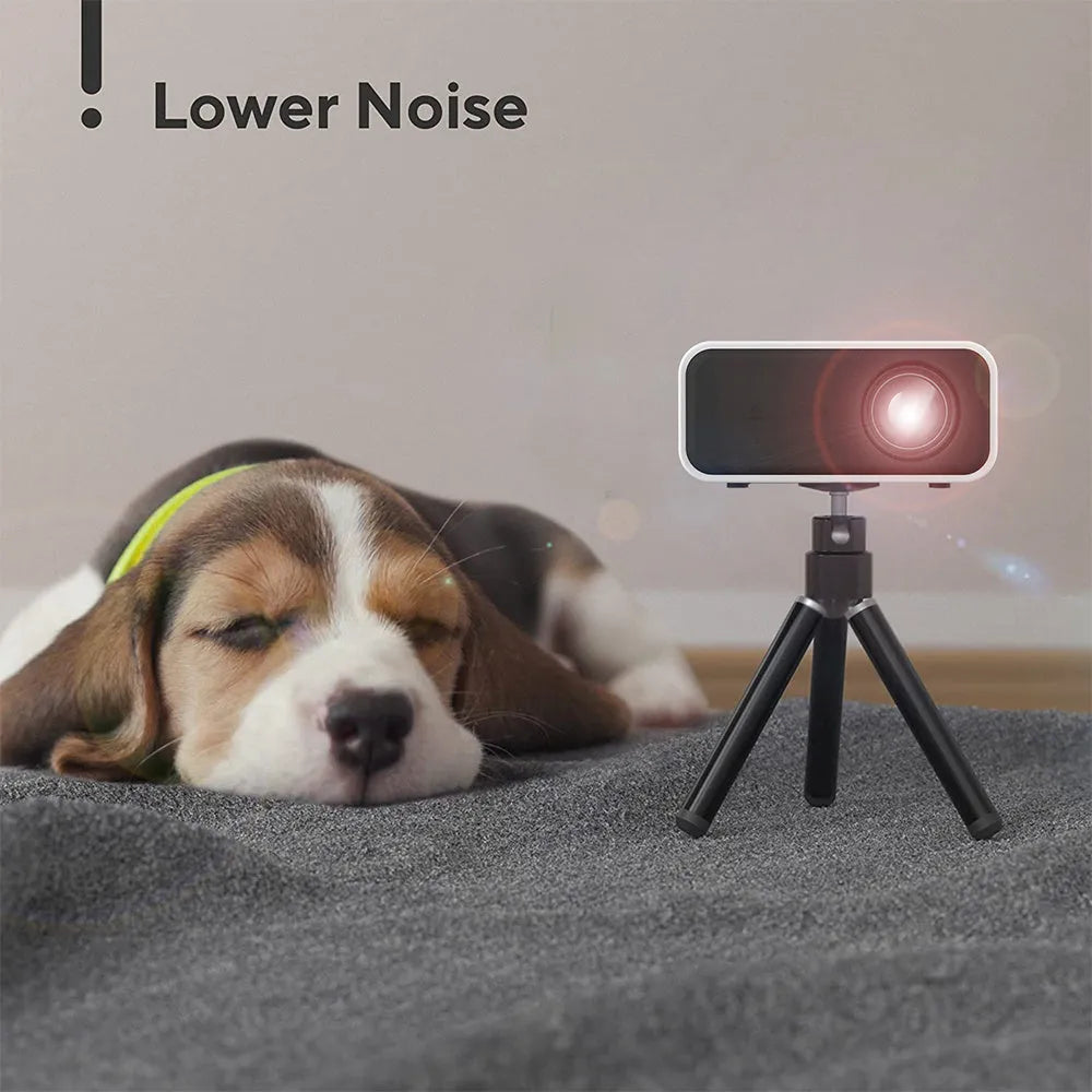 YT300 black or white portable mini projector with remote control on table projecting home theatre image