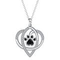 Women's copper necklace with dog paw pendant on cross chain
