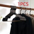 Elegant black non-slip anti-rust clothes hanger with a modern simplicity design.