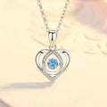 Blue diamond heart pendant necklace and matching bracelet jewellery set with mixed gem inlays