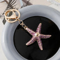 Starfish shell keychain ocean series electroplated pink purple blue simple suitcase decoration