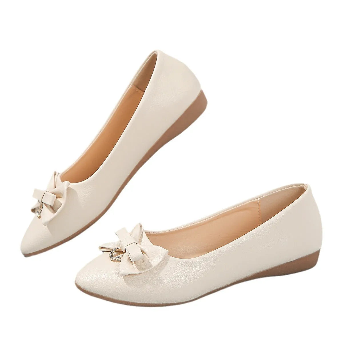 Women's beige casual flat shoes with a bowknot detail on the artificial PU upper.