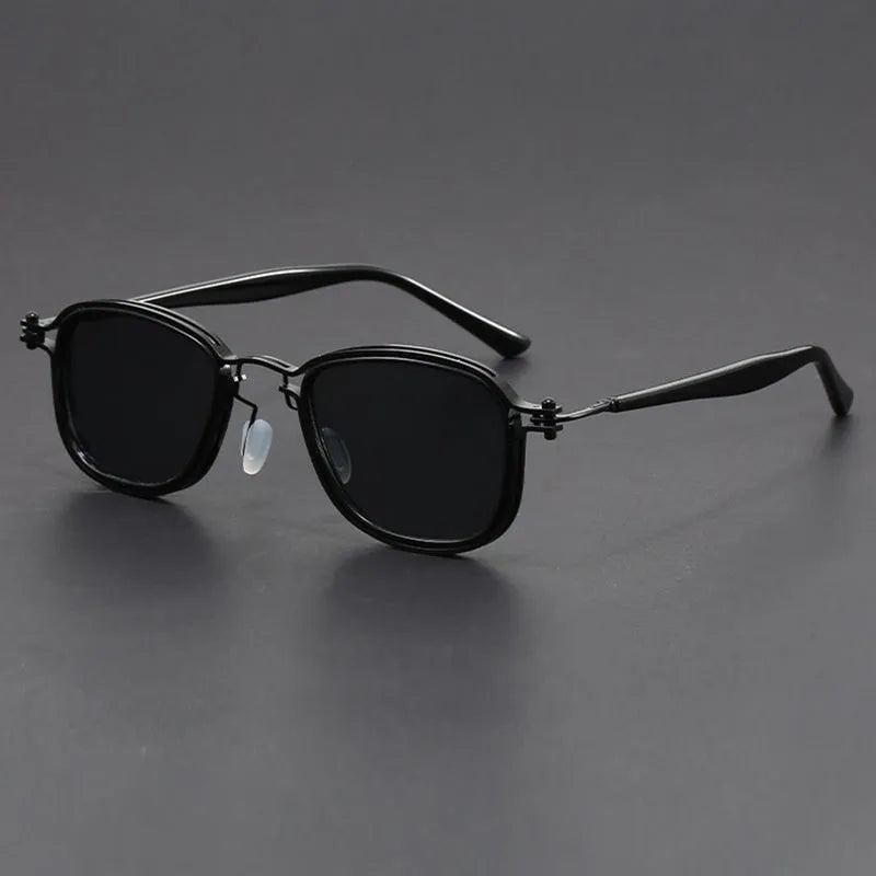 Retro square sunglasses with metal and plastic frame, shown in Hawksbill Tea colour with wave pattern on lenses.