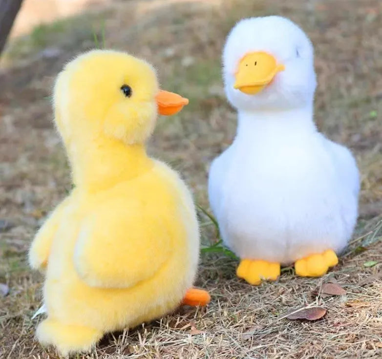 Soft plush simulation yellow duck doll 17cm height with sound feature