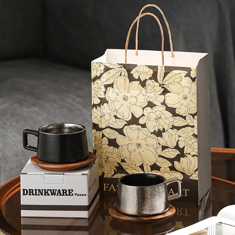 Gold and silver plated gift boxes with a solid colour 250ml tumbler coffee cup inside.