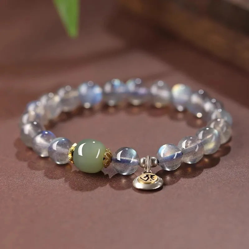 Birth Buddha Beads moonstone bracelet with 8mm beads featuring Thousand-Hand Kwan-yin mouse design