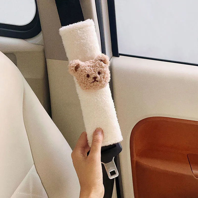 Cartoon bear plush baby car seat belt protective cover showing khaki and coffee colour options