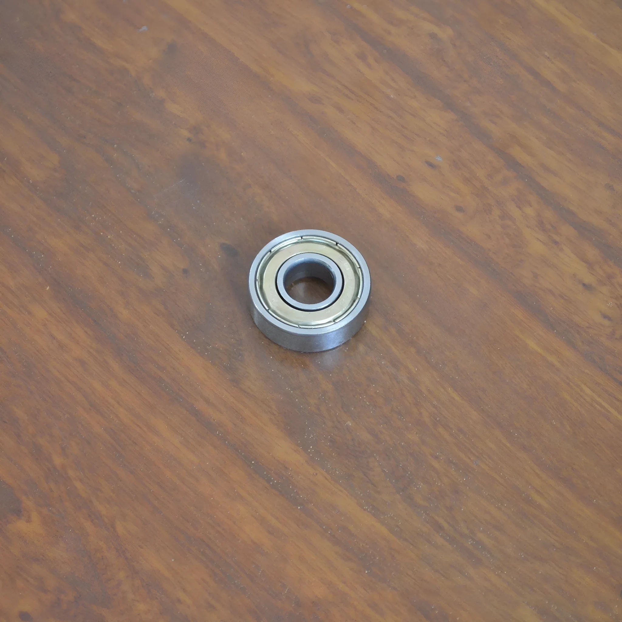 6000zz carbon steel ball bearing showing 10x26x8mm dimensions and iron retainer