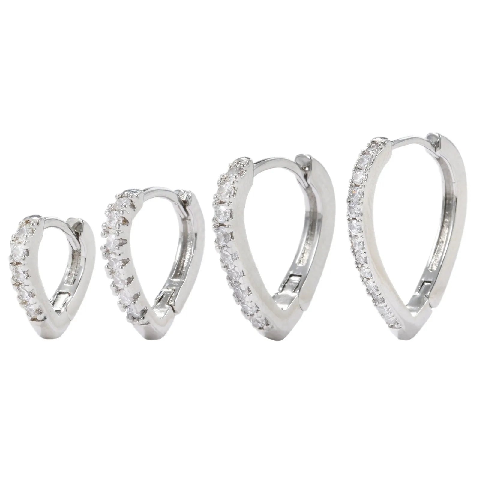 A geometric heart-shaped gold ear clip for women on a white background.