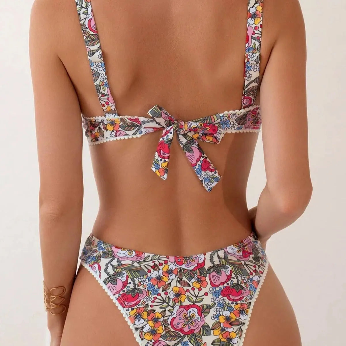 Women's floral print bikini set with steel bracket push-up top and matching high-waist briefs