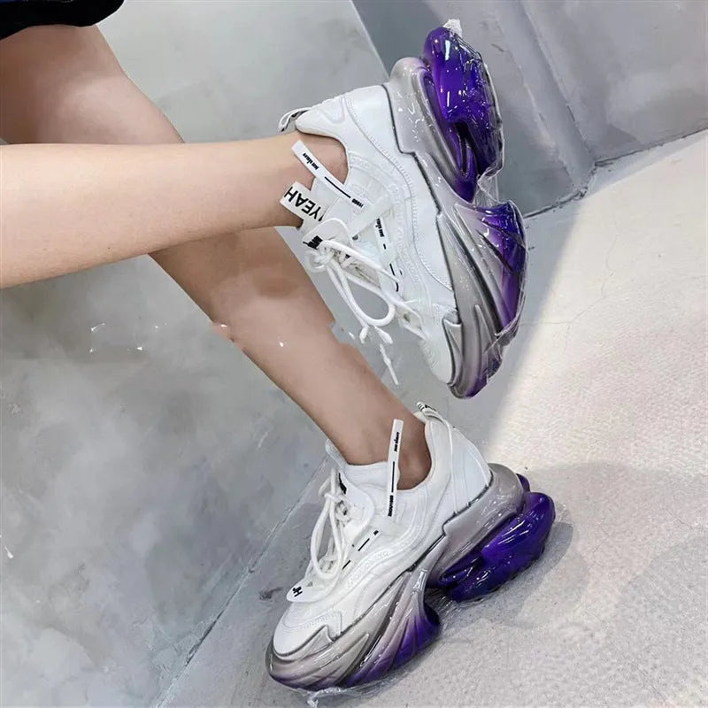 Women's leather casual sports shoes with a thick sole and cross-tie closure in multiple colours.