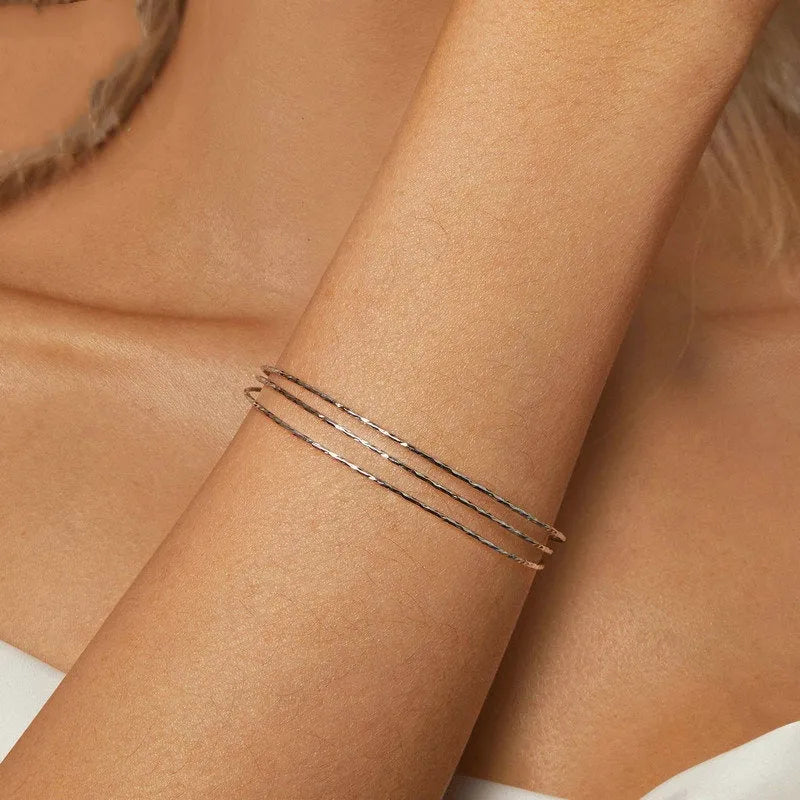 Simple multi-layer 925 sterling silver open-ended bracelet in electroplated colour SCB273 on light background