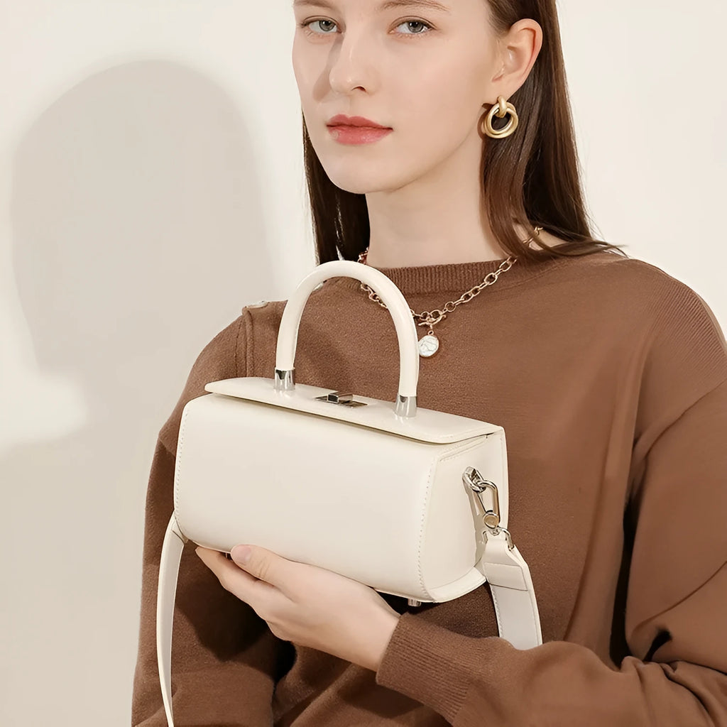Leather women's crossbody bag with clamshell design in urban simplicity style