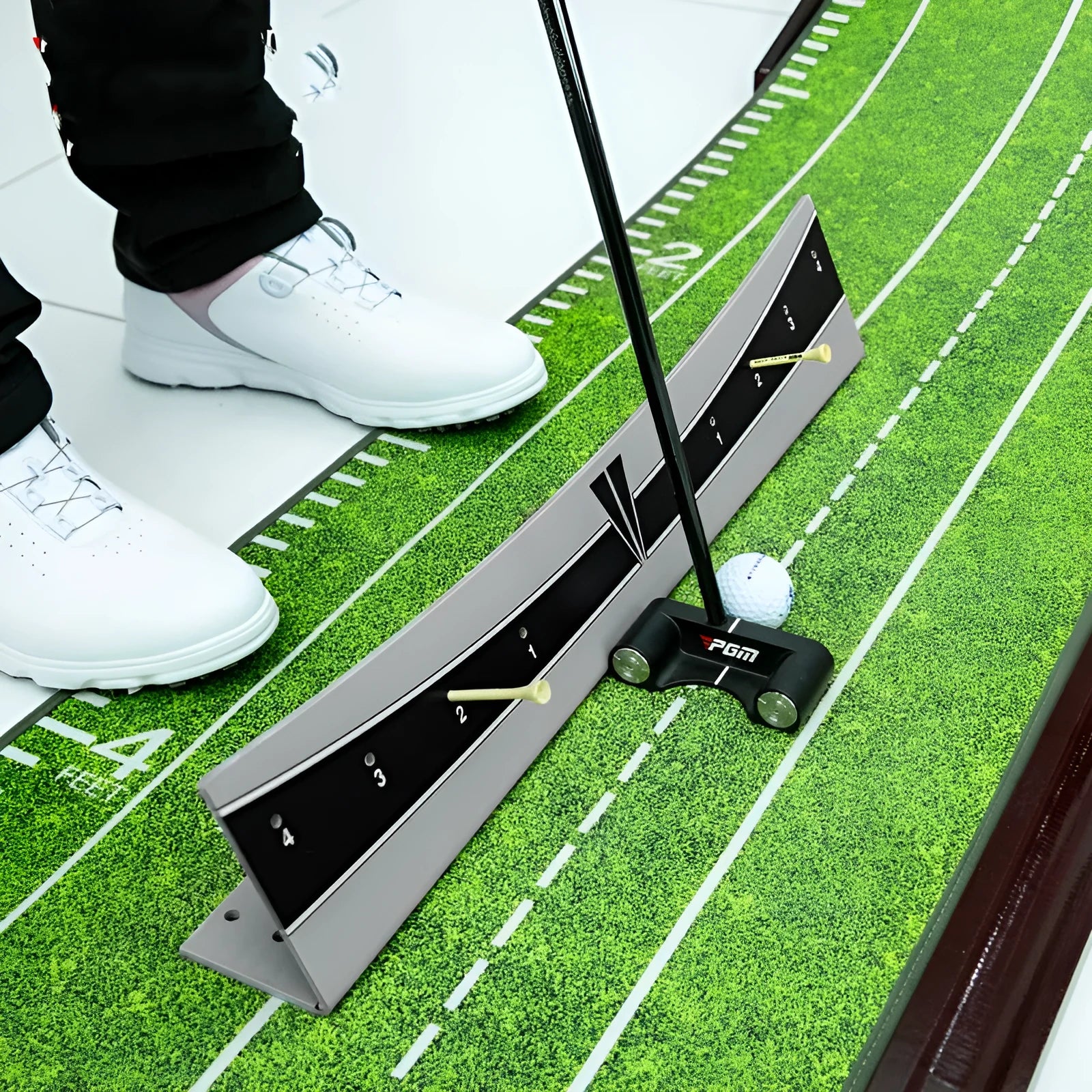 Golf putter trajectory balance simulator with adjustable PVC push rod on a flat surface