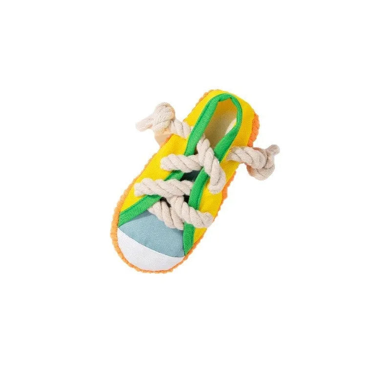 Squeaky plastic dog slippers toy in yellow, black, or blue colour for chewing and play.