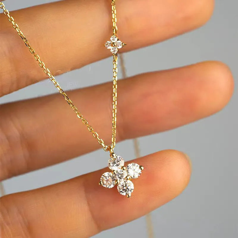 Silver O-ring clavicle necklace with gold colour finish, flower pendant 9.8 x 11.8mm, 40.5cm chain length
