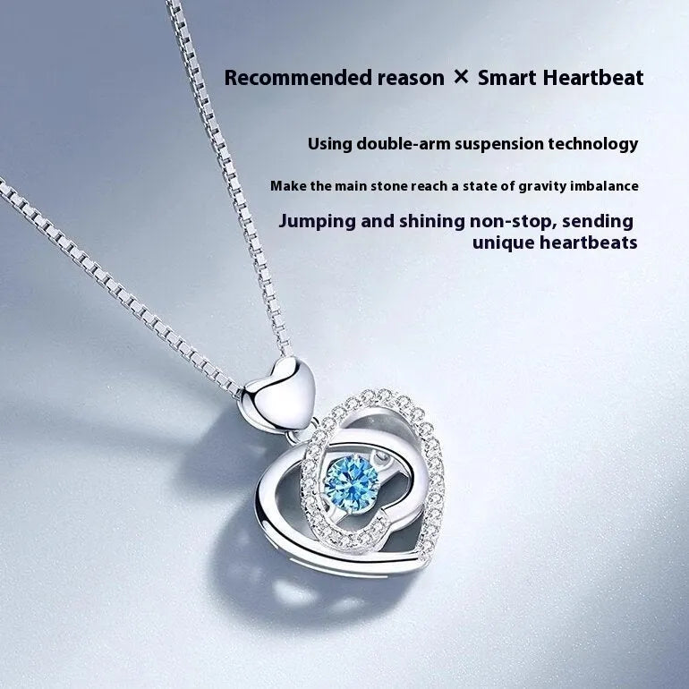 Blue diamond heart pendant necklace and matching bracelet jewellery set with mixed gem inlays