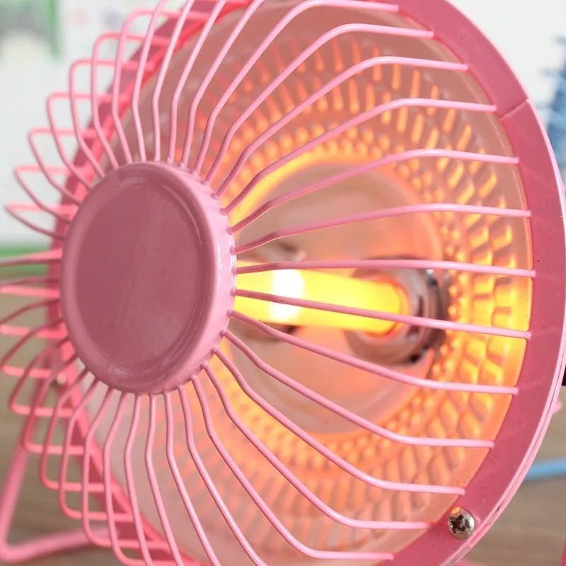 Bakingl Little Sun 4 inch black electric fan heater on a desk with quiet energy-saving operation