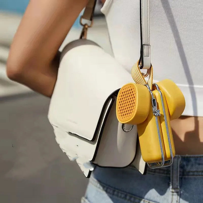 Folding USB portable mini fan in three colours: Cream Ice, Little Yellow Chicken, and Star Blue, with built-in battery