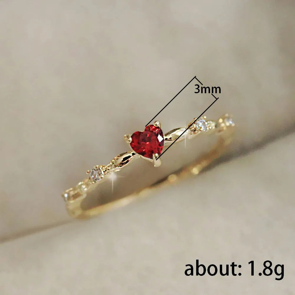 Gold or silver electroplated copper ring with peach heart charm and zircon detailing, sizes 6 to 10