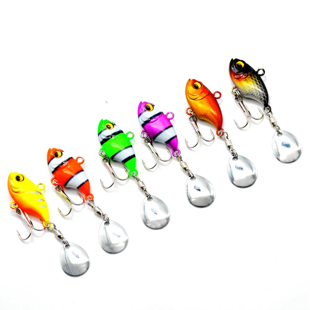 Metal fishing lure with a rotating sequin plate in zebra stripe orange colour.