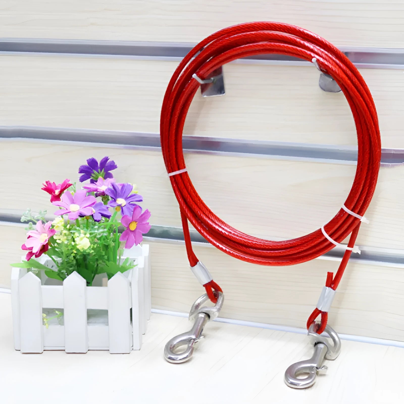 Double-headed dog leash with hand holding rope and steel wire iron chain in blue