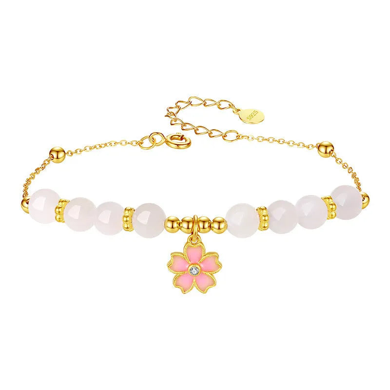 Pink women's bracelet with 925 silver cherry blossom pendant, Hetian jade beads, and gradient epoxy details.