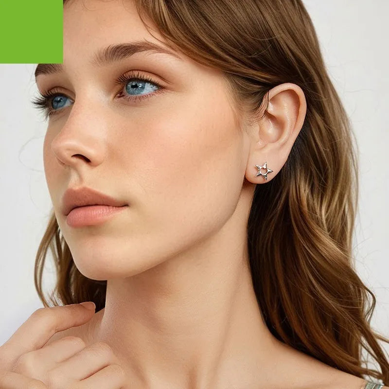 S925 sterling silver hollow pentagram star stud earrings, polished finish, SCE1886 colour, on white background