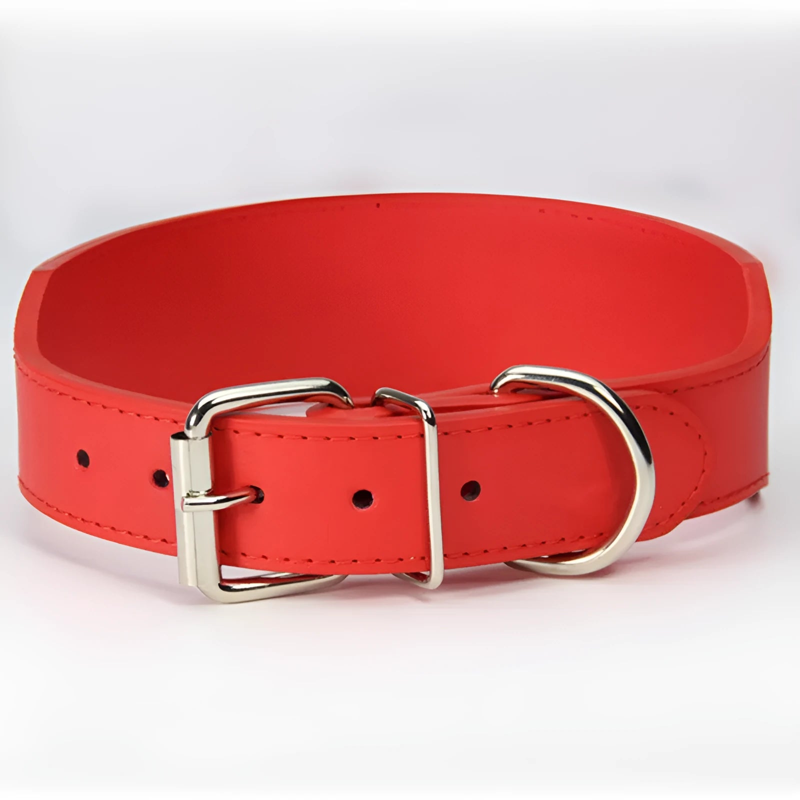 Fish-shaped red leather dog collar for large dogs on a size chart.