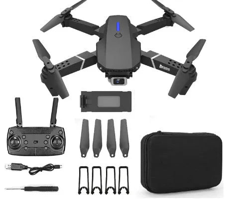 Grey foldable 4K dual camera drone with remote controller and carry bag, shown with propeller blades extended.