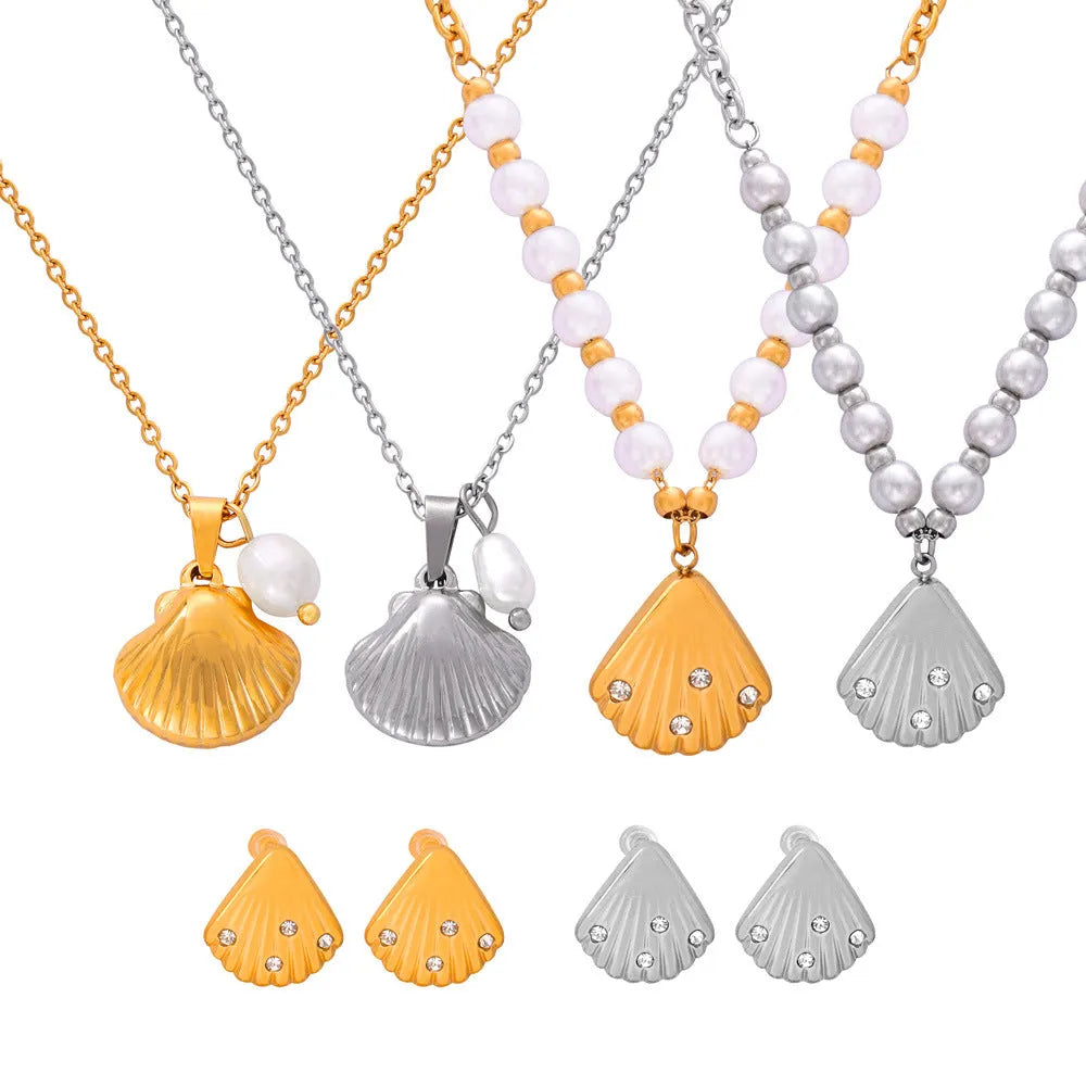 Women's titanium steel necklace with freshwater pearl beads and French vintage shell pendant.
