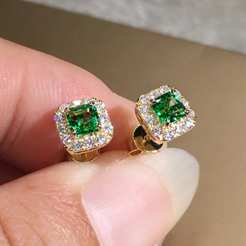 Square-cut grandmother green zircon stud earrings in electroplated copper with gold or white gold colour options.
